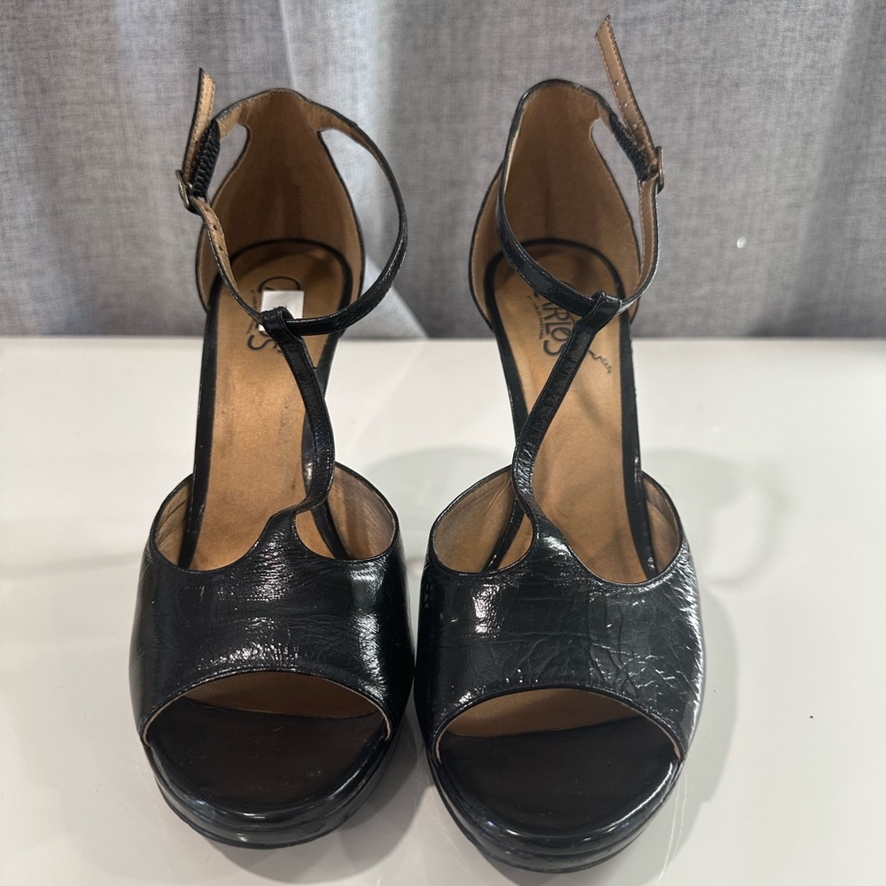 Women’s black heels by Carlos. Pre owned.